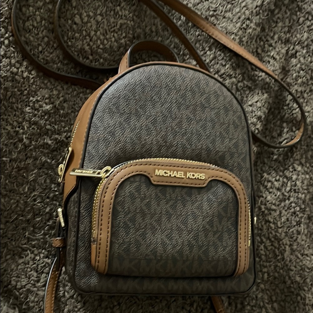 Michael Kors Brown Backpack with Signature Monogram and Gold Accents